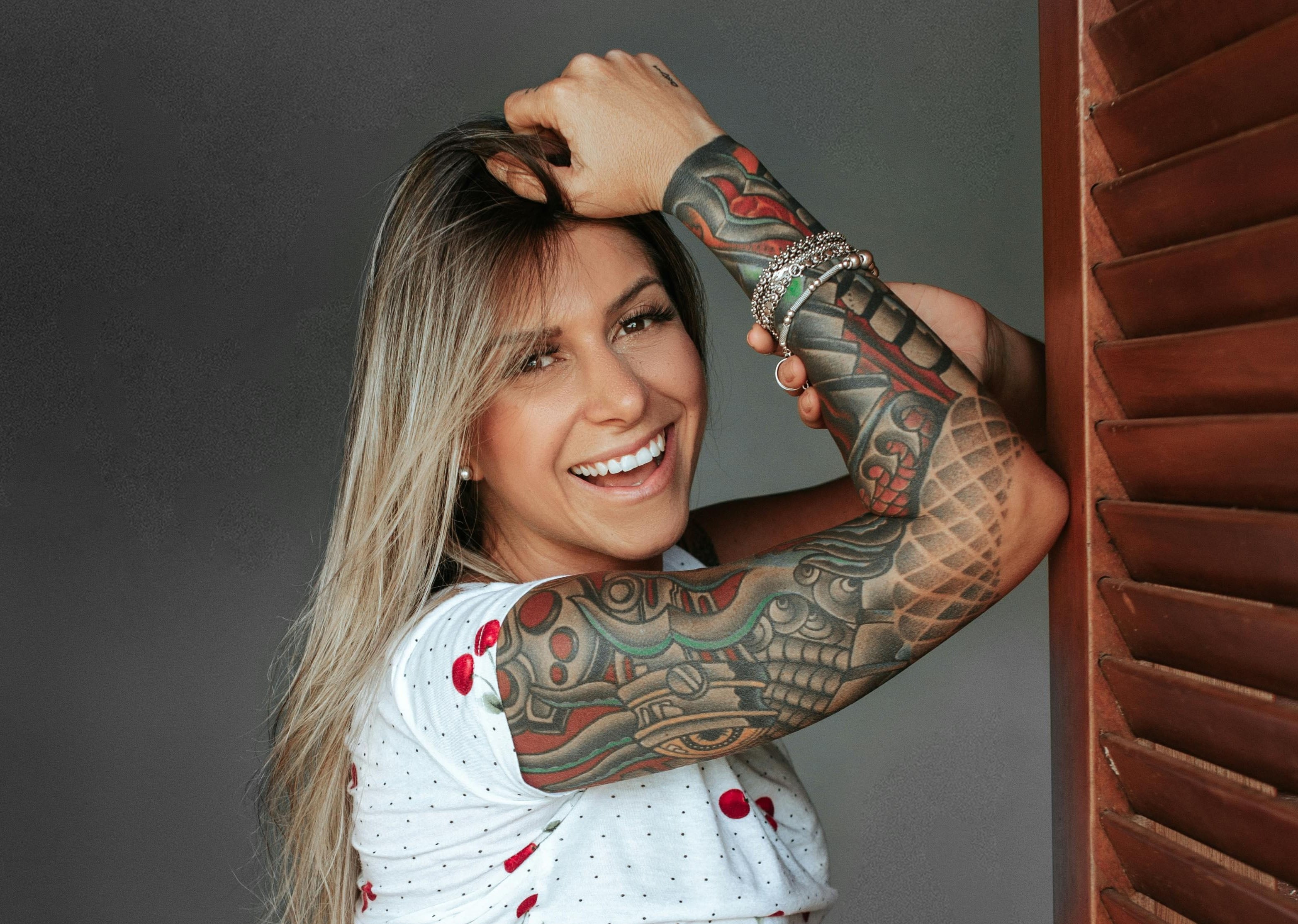 woman with sleeve tattoo