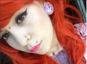 cute bridge piercing on a girl