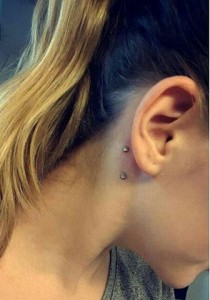 surface piercing behind ear