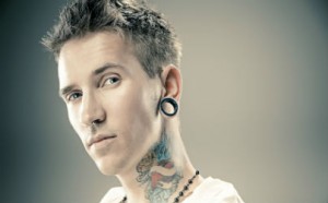 sexy guy with plugs and tattoos