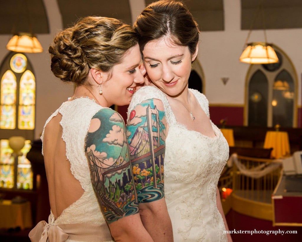 Brides with arm tattoo mural sleeves