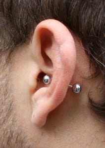 Conch piercing with straight barbell