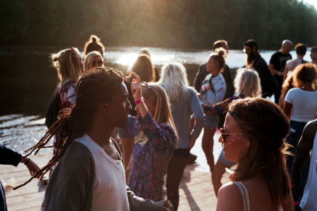 People at an outdoor music festival