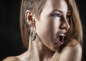 Pierced girl screaming talking sassy girl piercings body piercings body mods FreshTrends facial piercings