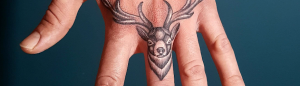 Deer finger tattoo by Spayk Tattoo