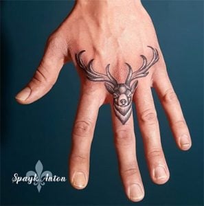 Deer finger tattoo by Spayk Tattoo