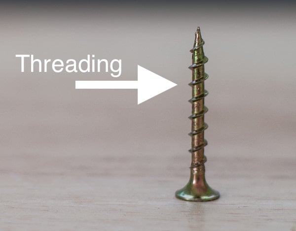 an upside down screw with an arrow pointing to the threading