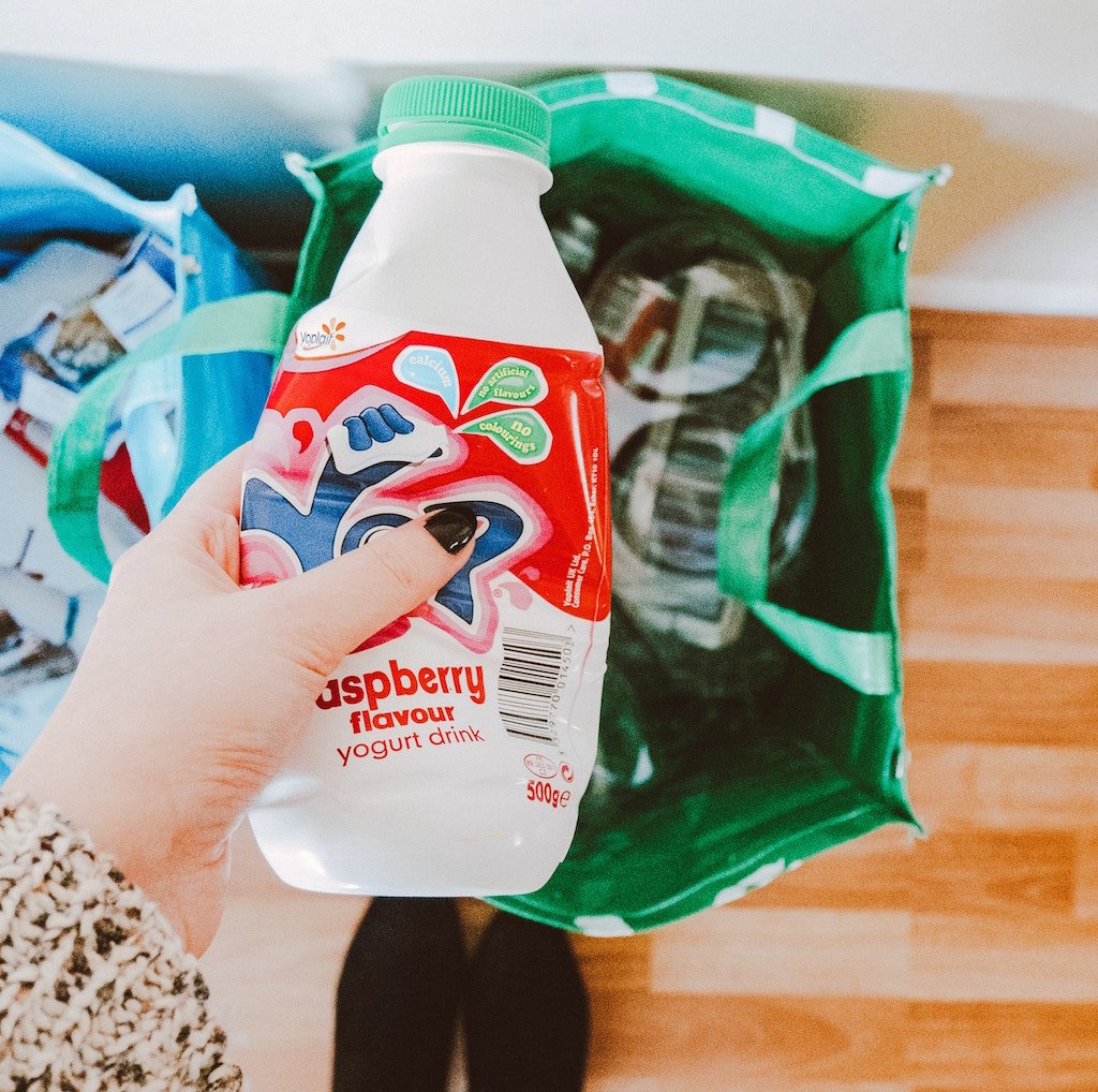 Person Recycling a Plastic Bottle