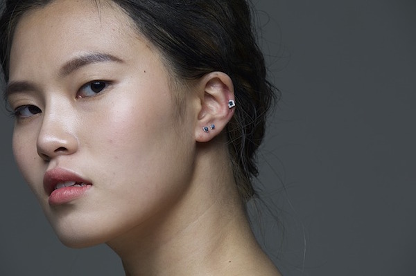 woman with cartilage piercings