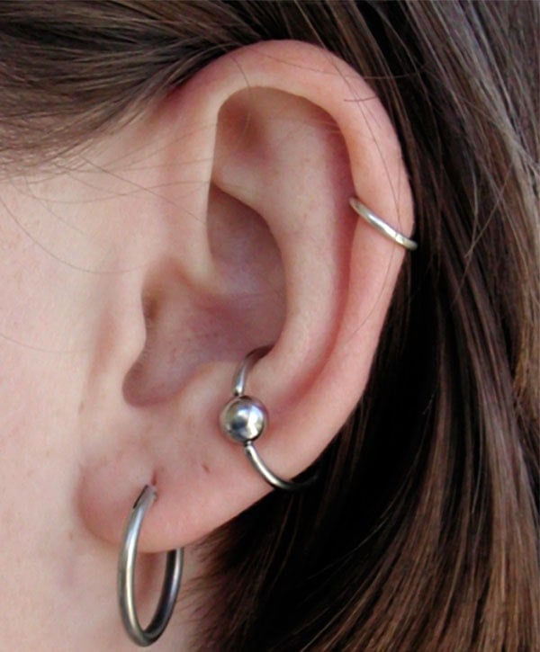 Pierced ear with surgical steel jewelry