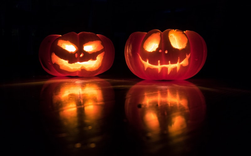 two jack-o-lanterns in the dark