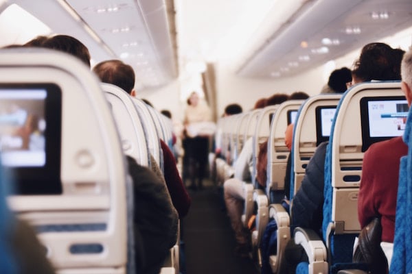 airplane aisle on a full plane