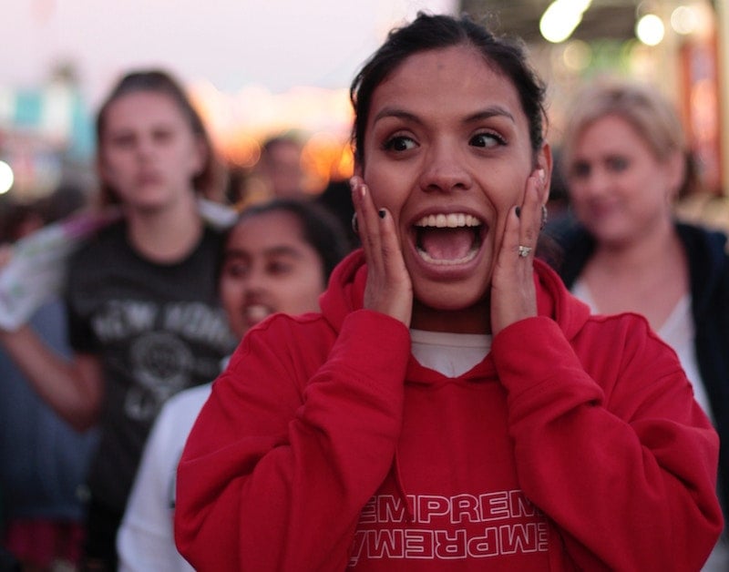 Girl Gasps With Hands on Face