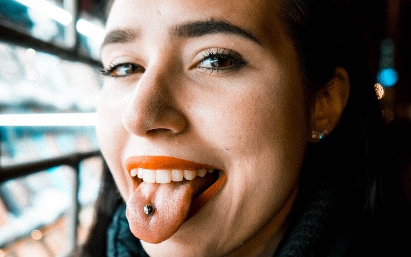 Woman With Tongue Piercing