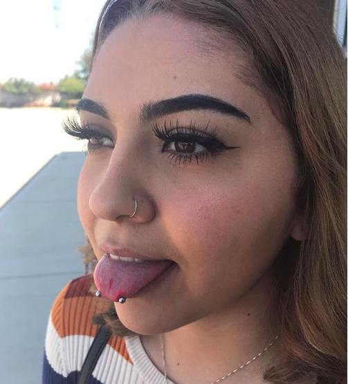 Woman with Snake Eyes Piercing