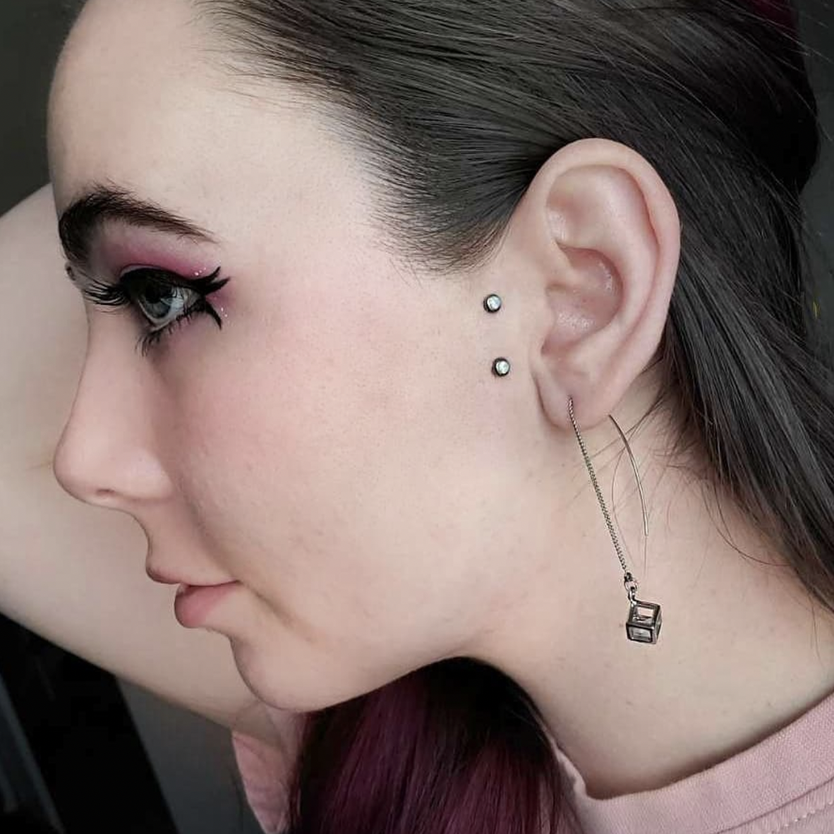 woman with surface piercing by her ear