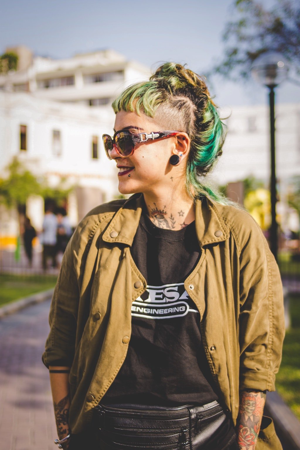 A Woman with Many Tattoos and piercings