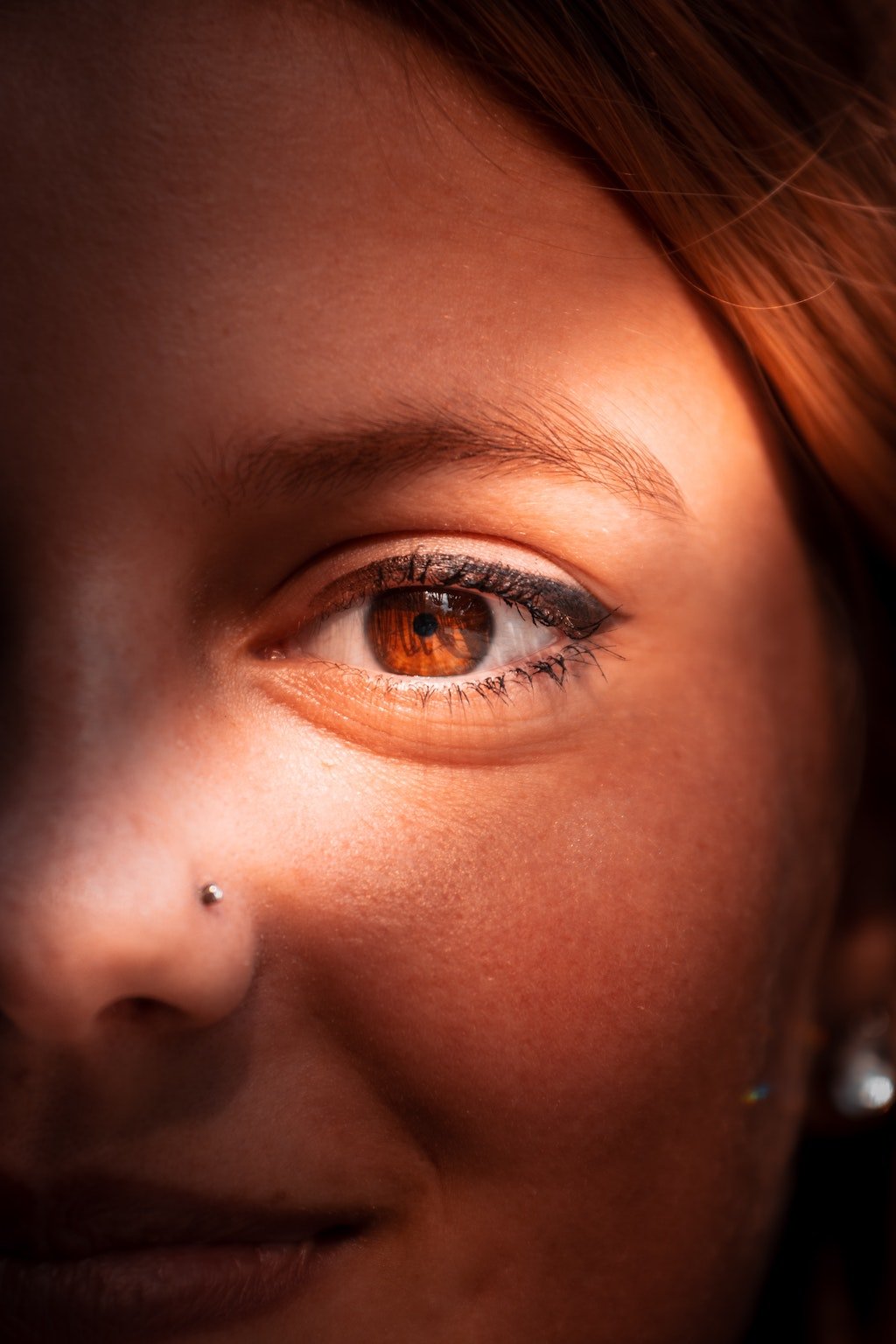 nose piercing close up scar