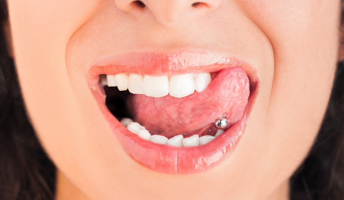 Woman with tongue piercing